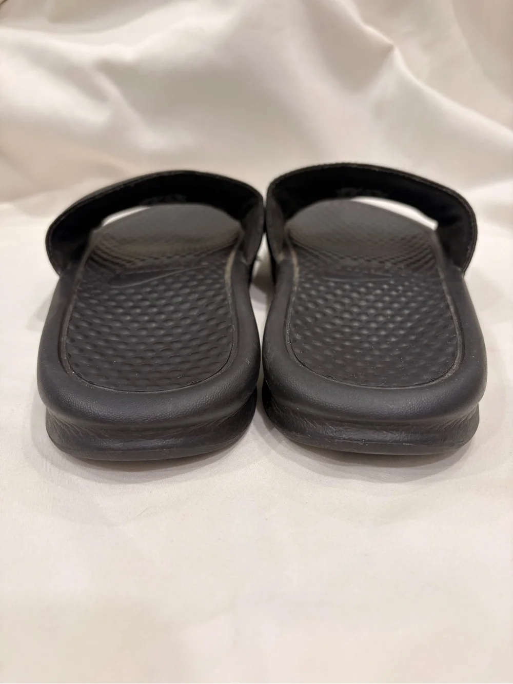 Woman’s Nike Benassi Black and Rose Gold Slides Size 7
